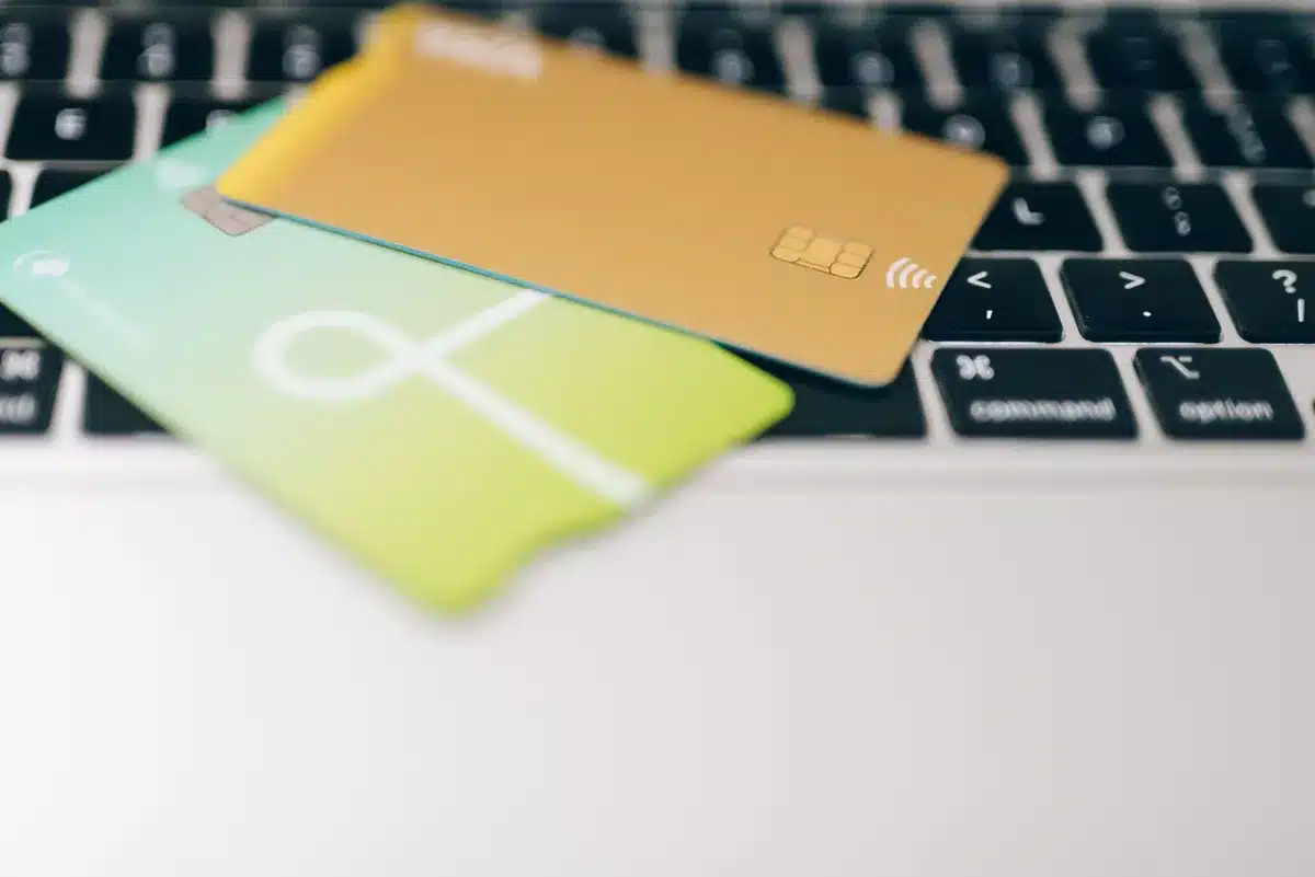 Close-up view of a payment card's internal chip and copper antenna components