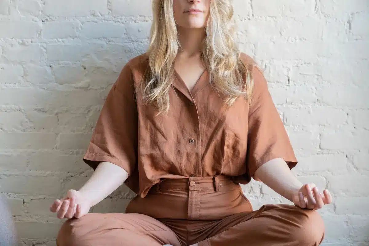 Person in a calm, focused state during meditation or mindful practice.