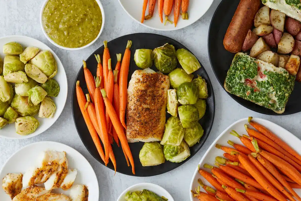 Healthy plate with whole foods including vegetables, proteins and healthy fats