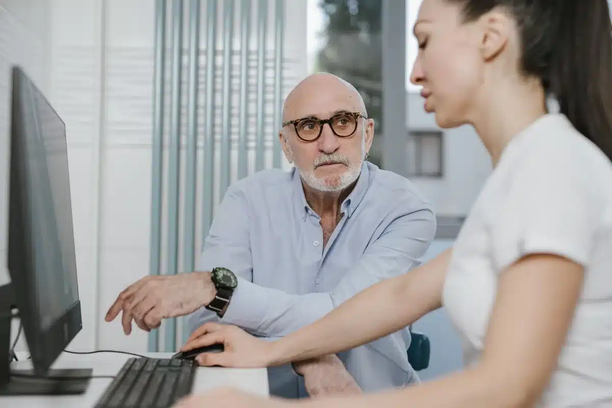 Clinician discussing prostate screening and testosterone therapy risks with a patient