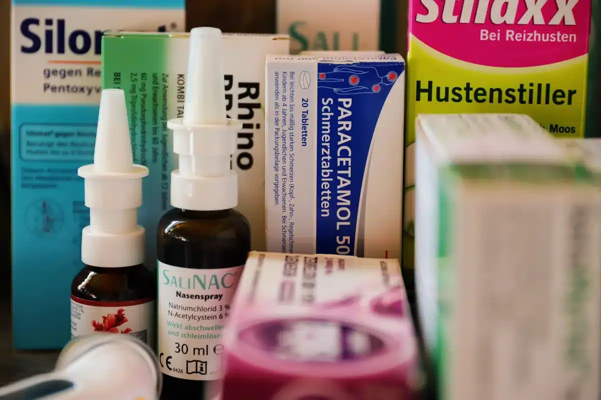 Naloxone nasal spray and injectable kit displayed on a surface