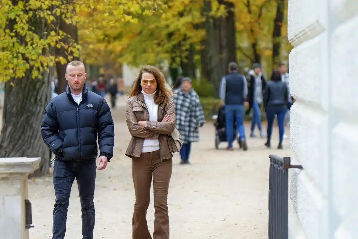 People brisk walking in a sunny park for aerobic exercise