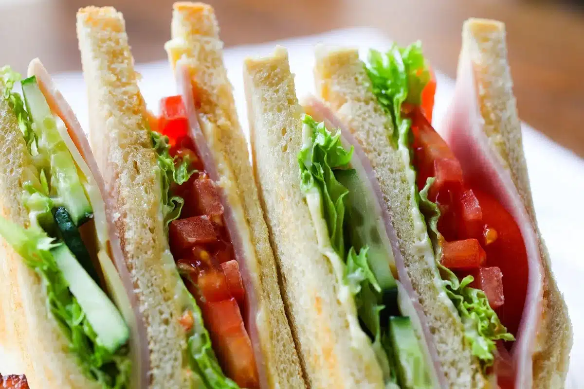 Toast rubbed with garlic and a small bowl of dressing, an easy way to consume raw garlic